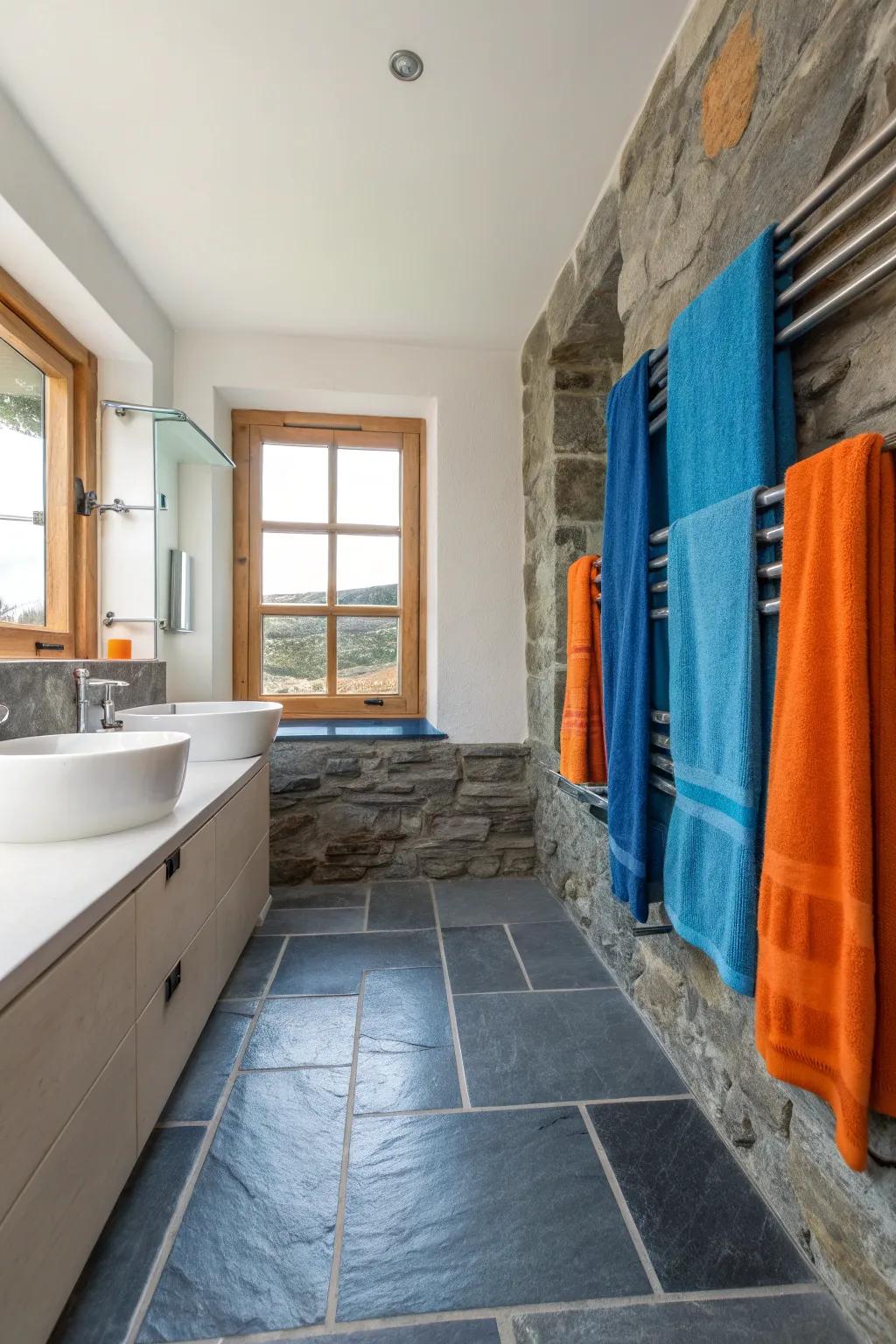 Minimalist fixtures allow your slate floors to take center stage in a stylish, understated bathroom.