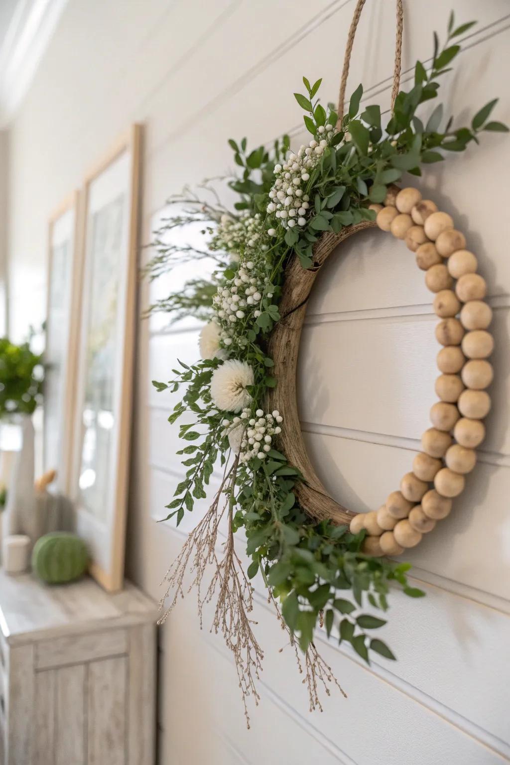 Add volume and texture to your wreaths by weaving in wooden bead garlands.