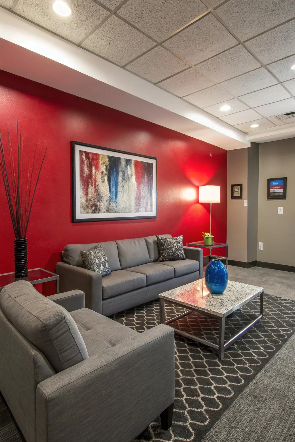 A red accent wall paired with gray elements brings a dynamic and balanced energy to any room.