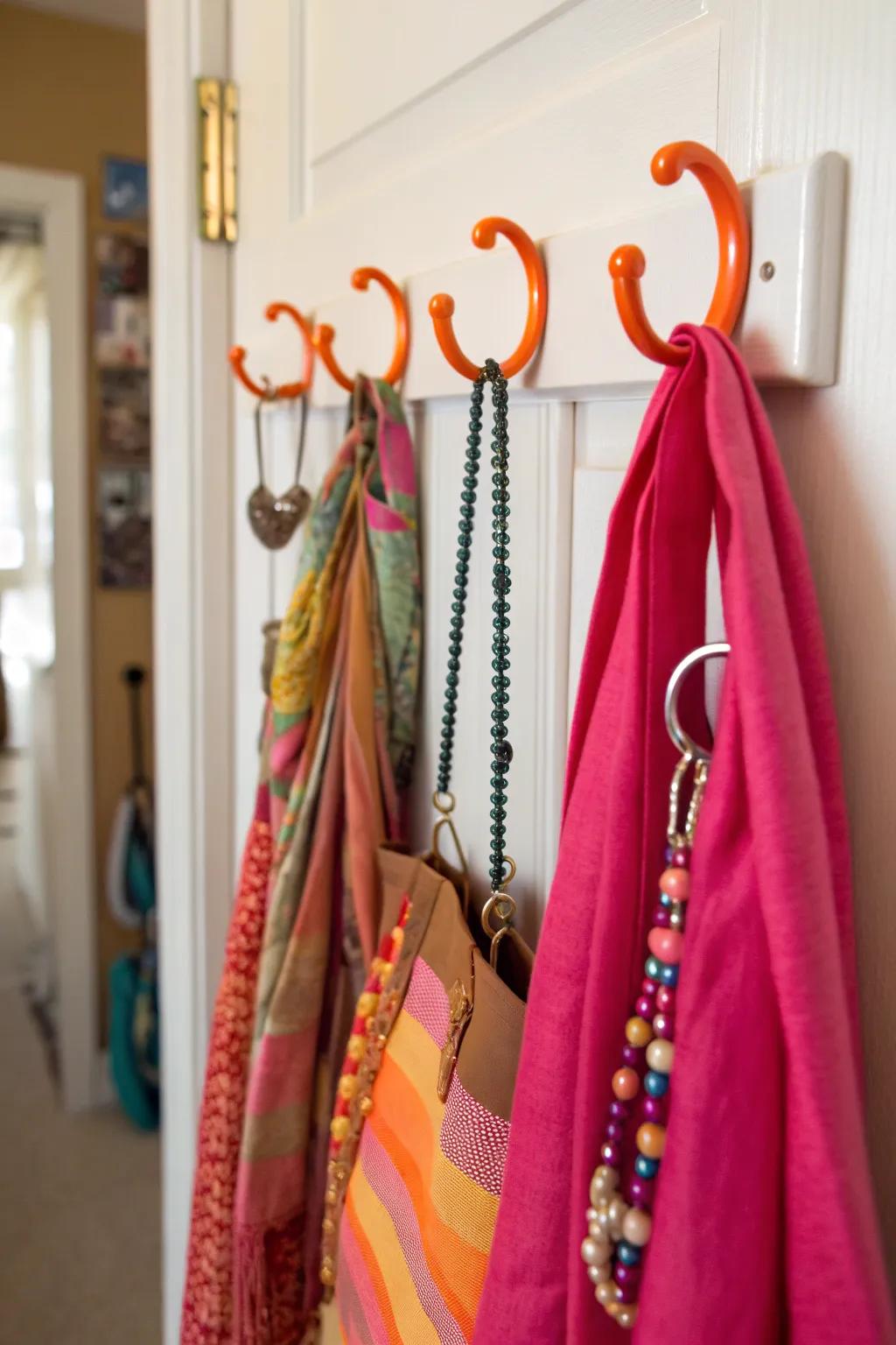 Hooks on the inside of the door offer a clever way to keep accessories organized and at hand.