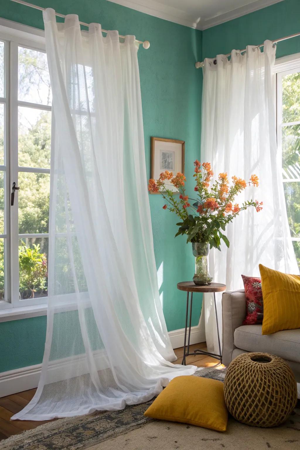 Let the light in with white sheer curtains that create a bright and airy atmosphere. #HomeBrightening #WindowStyle